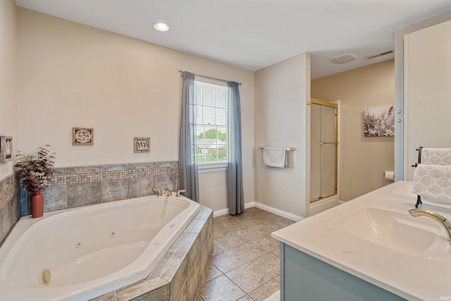 2006 Capital Hill Ct, Kokomo, IN 46902 - full bathroom with a tub with jets, a stall shower, baseboards, vanity, and tile patterned flooring
