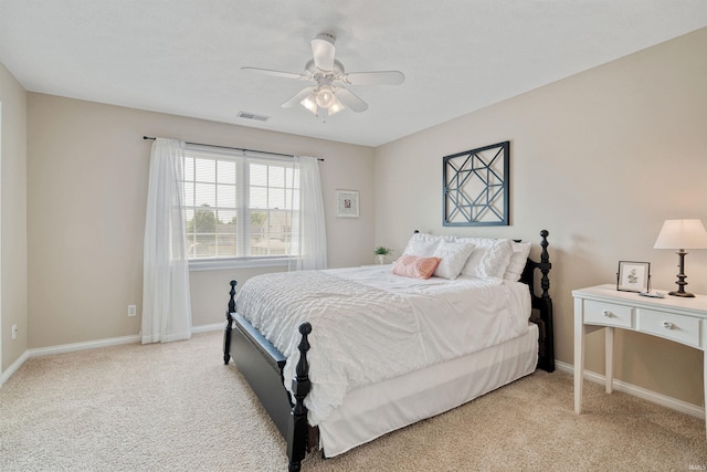 2006 Capital Hill Ct, Kokomo, IN 46902 - bedroom with light carpet, baseboards, and a ceiling fan