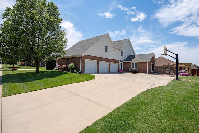 2006 Capital Hill Ct, Kokomo, IN 46902 - view of front of property with driveway and brick siding