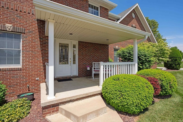 2006 Capital Hill Ct, Kokomo, IN 46902 - view of exterior entry featuring covered porch and brick siding