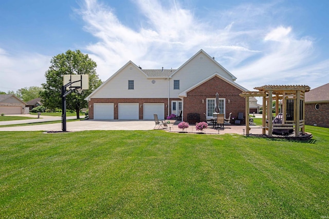 2006 Capital Hill Ct, Kokomo, IN 46902 - rear view of property featuring a pergola, driveway, brick siding, a lawn, and a patio