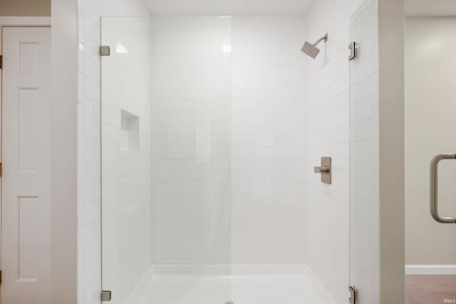 7301 W River Rd, Yorktown, IN 47396 - full bathroom with a shower stall and baseboards