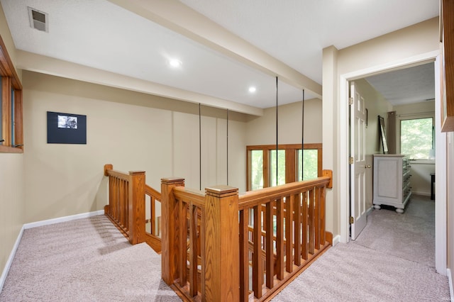 7301 W River Rd, Yorktown, IN 47396 - hall featuring an upstairs landing, carpet flooring, baseboards, and recessed lighting