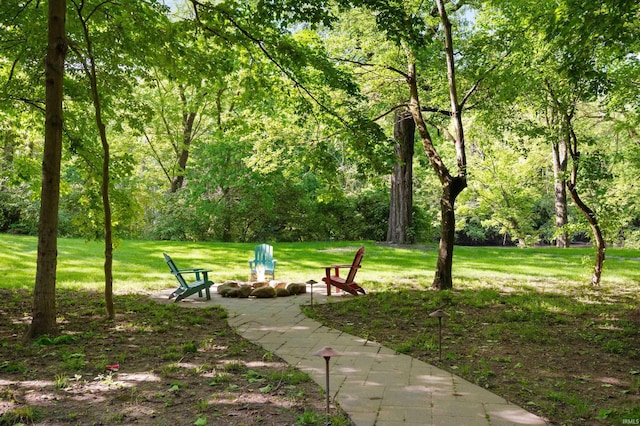 7301 W River Rd, Yorktown, IN 47396 - view of community with an outdoor fire pit and a lawn