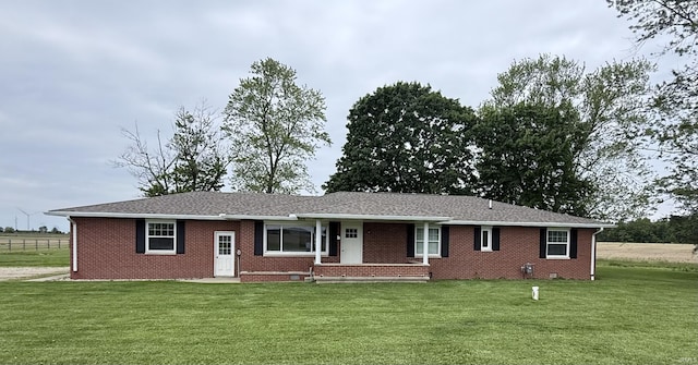 7540 S US-27 Hwy, Portland, IN 47371 - single story home with a front lawn, brick siding, and covered porch