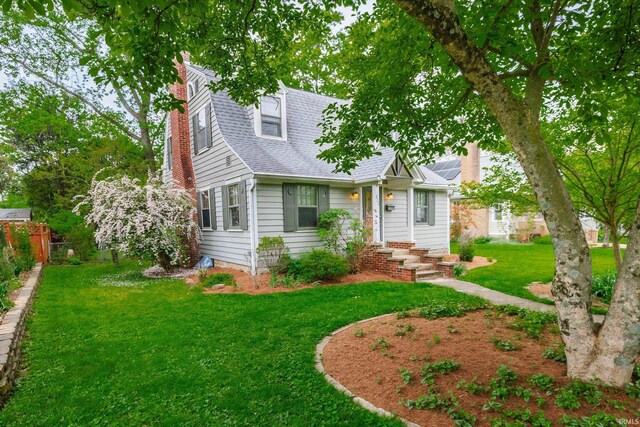 822 S Stull Ave, Bloomington, IN 47401 - view of front of home with a chimney and a shingled roof
