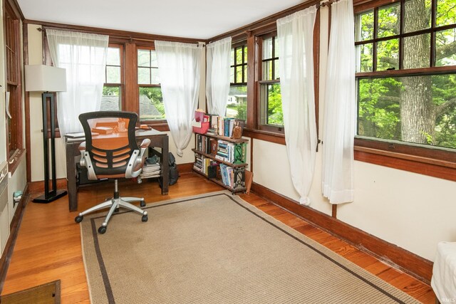 822 S Stull Ave, Bloomington, IN 47401 - home office with wood finished floors, healthy amount of natural light, and baseboards