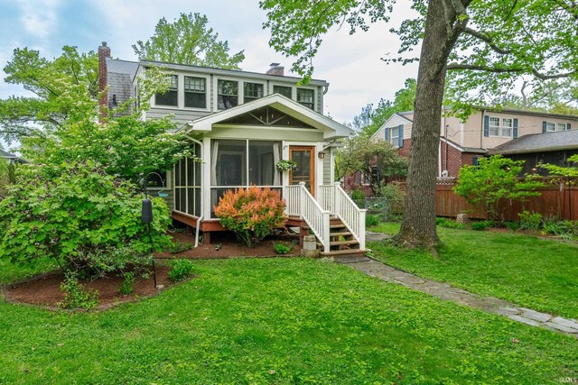 822 S Stull Ave, Bloomington, IN 47401 - view of front of home with a chimney and a sunroom