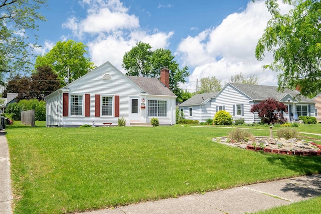 3724 Hiawatha Blvd, Fort Wayne, IN 46809 - view of front of house with a chimney and a front yard