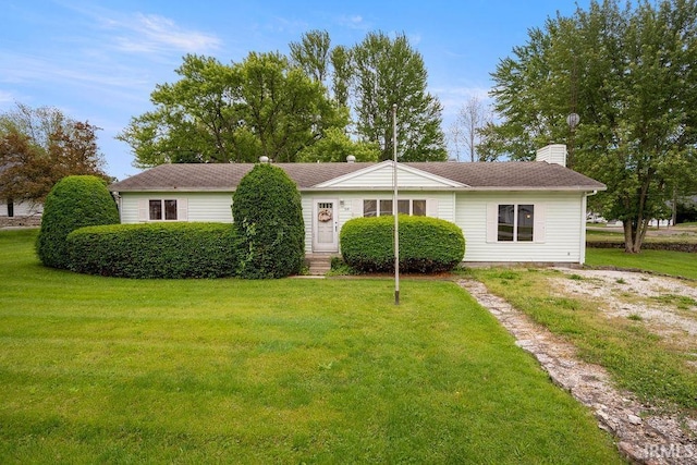 315 E Payton St, Greentown, IN 46936 - ranch-style home featuring a front lawn and a chimney