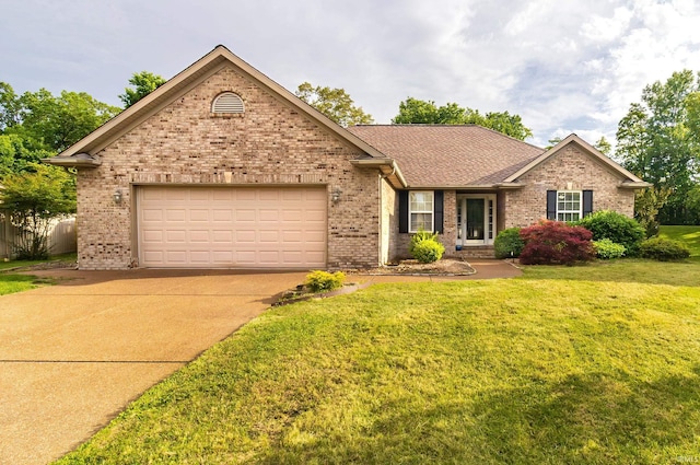 105 Temple Dr, Newburgh, IN 47630 - single story home with concrete driveway, brick siding, and a front lawn