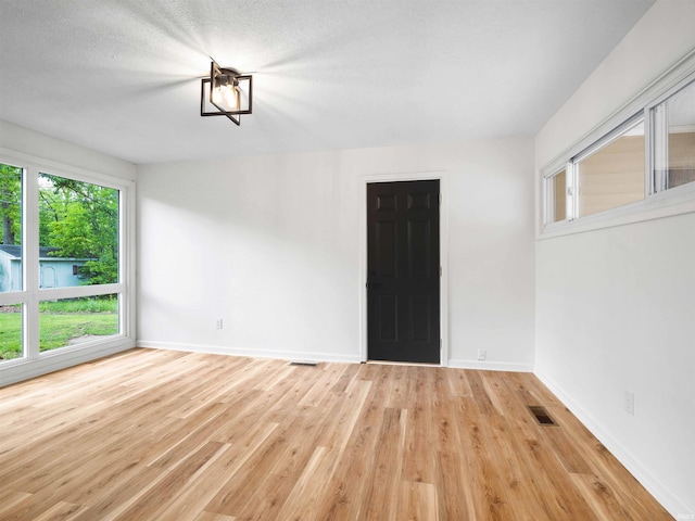 2834 Inwood Dr, Fort Wayne, IN 46815 - unfurnished room featuring wood finished floors and baseboards
