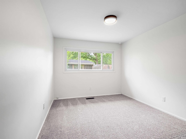 2834 Inwood Dr, Fort Wayne, IN 46815 - empty room featuring carpet floors and baseboards