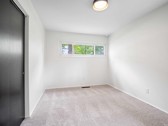 2834 Inwood Dr, Fort Wayne, IN 46815 - unfurnished bedroom featuring carpet and baseboards