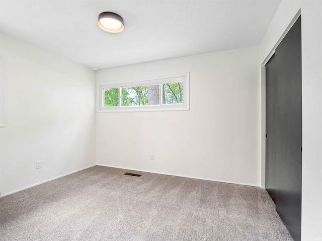 2834 Inwood Dr, Fort Wayne, IN 46815 - unfurnished bedroom featuring carpet floors and baseboards