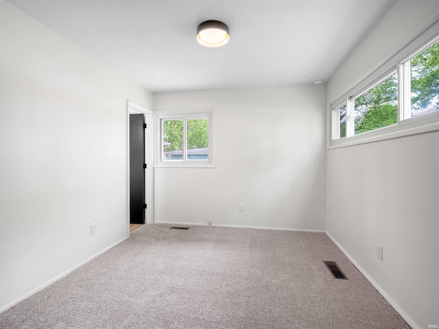 2834 Inwood Dr, Fort Wayne, IN 46815 - carpeted empty room featuring healthy amount of natural light and baseboards