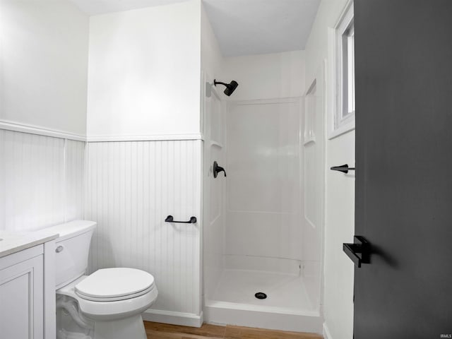 2834 Inwood Dr, Fort Wayne, IN 46815 - full bath featuring a stall shower, vanity, wood finished floors, and toilet