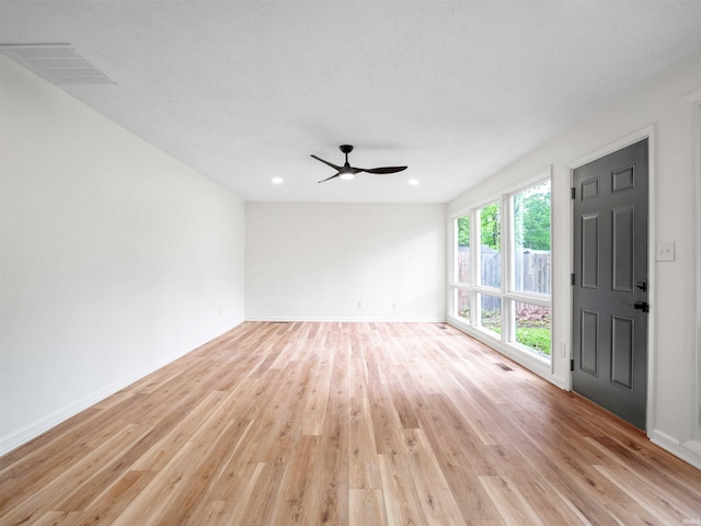2834 Inwood Dr, Fort Wayne, IN 46815 - empty room featuring light wood-style flooring, a ceiling fan, baseboards, and recessed lighting