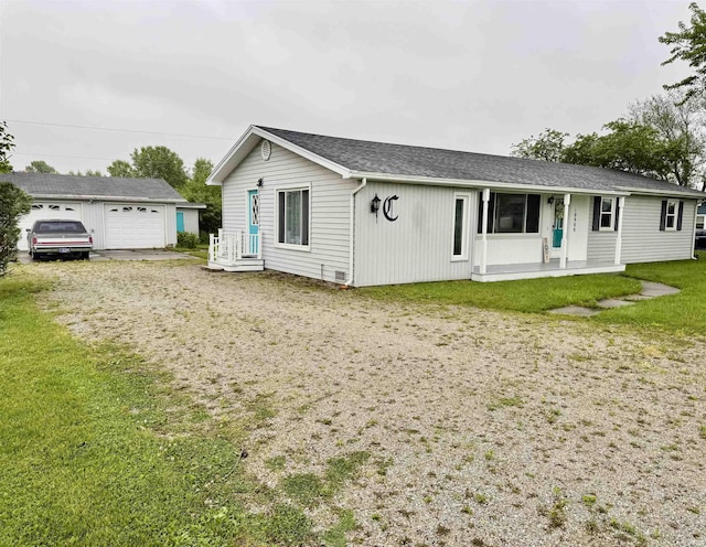 10908 Kathy Dr, Fort Wayne, IN 46835 - single story home featuring an outbuilding, a front yard, a shingled roof, and a garage