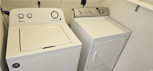 1250 W Adams Hill Cir Unit 401, Bloomington, IN 47403 - washroom with washer and dryer