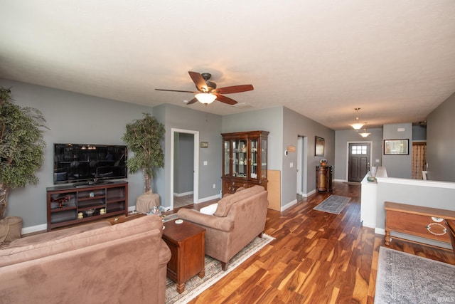 6336 Munsee Dr, West Lafayette, IN 47906 - living area featuring a ceiling fan, dark wood-style floors, and baseboards