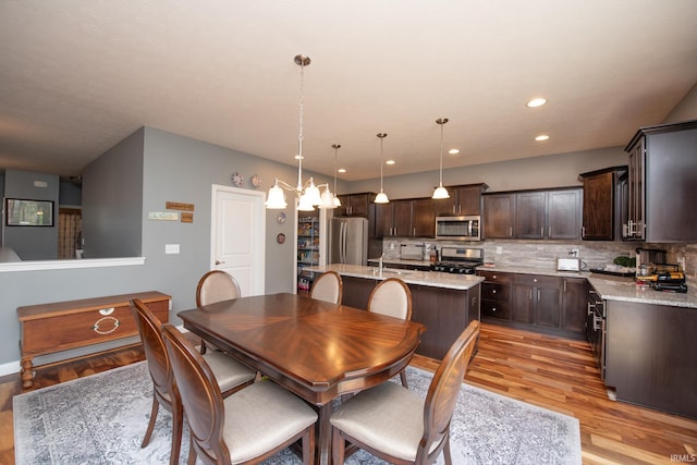 6336 Munsee Dr, West Lafayette, IN 47906 - dining area featuring light wood finished floors and recessed lighting
