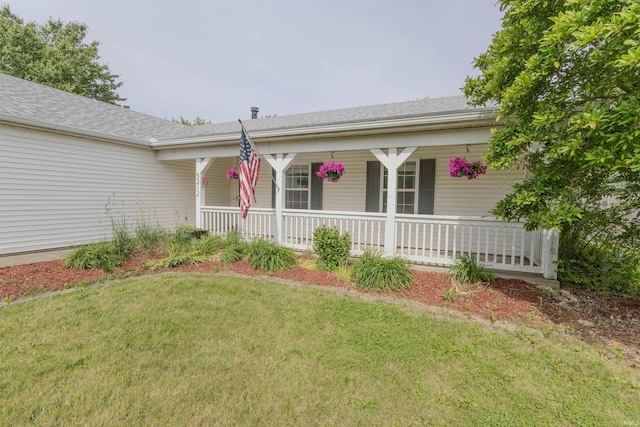 5212 E 600 S, Lafayette, IN 47909 - ranch-style home featuring covered porch, a front yard, and roof with shingles