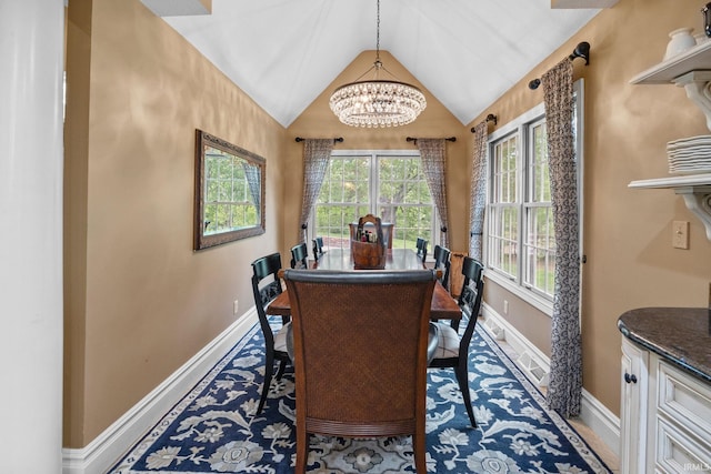 2525 Hastye Hyll, Logansport, IN 46947 - dining space featuring baseboards, a chandelier, and vaulted ceiling