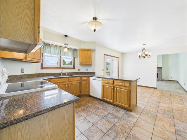 3715 W 630 Rd N, Huntington, IN 46750 - kitchen with white appliances, a peninsula, a chandelier, a sink, and hanging light fixtures