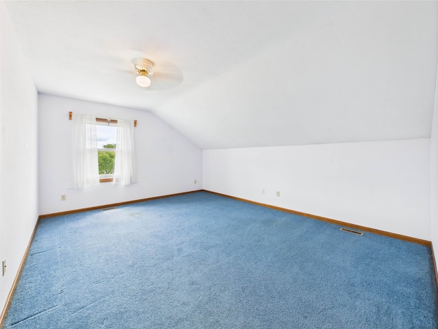 3715 W 630 Rd N, Huntington, IN 46750 - additional living space with baseboards, lofted ceiling, carpet flooring, and a ceiling fan