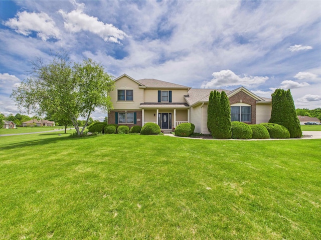 3715 W 630 Rd N, Huntington, IN 46750 - traditional-style home with a front yard and brick siding