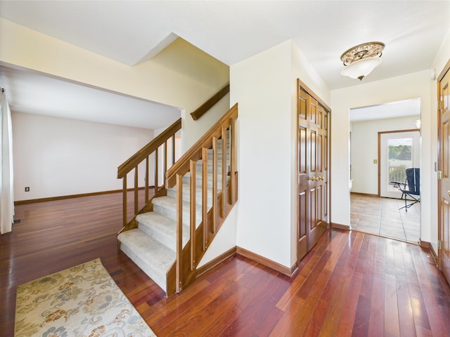 3715 W 630 Rd N, Huntington, IN 46750 - stairway with hardwood / wood-style flooring and baseboards