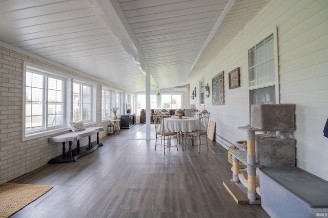 6497 N 500 E, Union City, IN 47390 - sunroom featuring wood finished floors, brick wall, and beamed ceiling