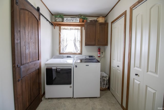 6497 N 500 E, Union City, IN 47390 - washroom featuring washer and clothes dryer, cabinet space, and a barn door