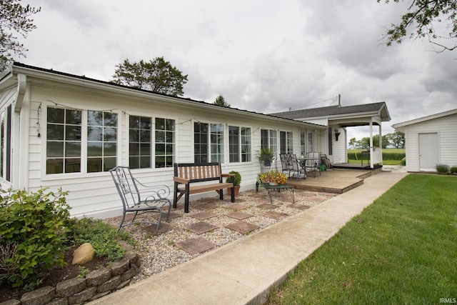 6497 N 500 E, Union City, IN 47390 - back of house with a yard, a deck, and a patio area