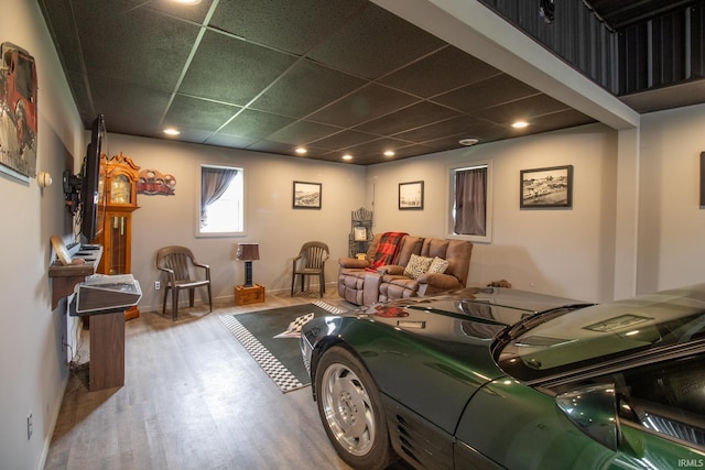 6497 N 500 E, Union City, IN 47390 - living room with wood finished floors, a paneled ceiling, and recessed lighting