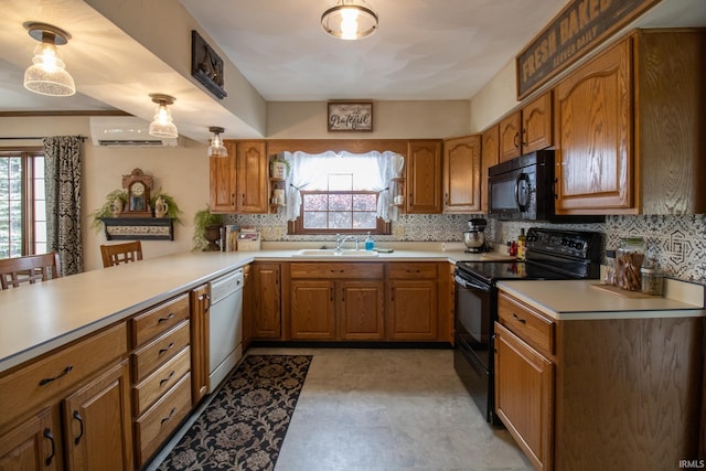6497 N 500 E, Union City, IN 47390 - kitchen featuring black appliances, a sink, plenty of natural light, and brown cabinets