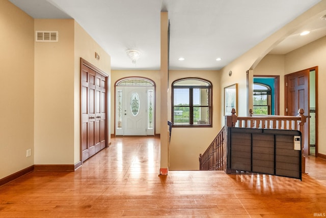 2395 S 400 St W, Warsaw, IN 46580 - entryway with hardwood / wood-style floors, baseboards, recessed lighting, and arched walkways