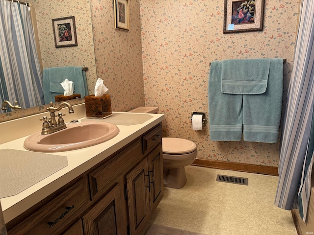 2807 Avondale Rd, Vincennes, IN 47591 - bathroom with vanity, wallpapered walls, toilet, curtained shower, and baseboards