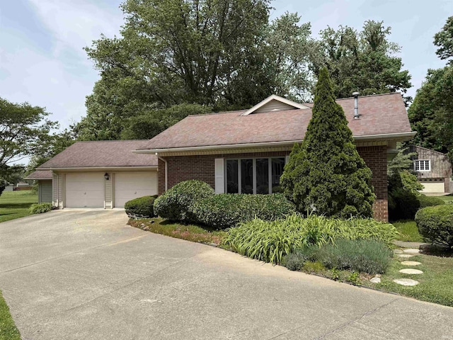 2807 Avondale Rd, Vincennes, IN 47591 - single story home featuring driveway, brick siding, a garage, and a shingled roof