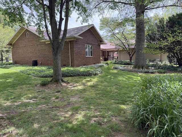 2807 Avondale Rd, Vincennes, IN 47591 - view of side of property with brick siding and a lawn