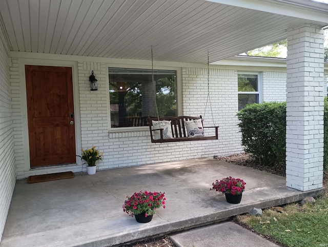704 Avondale St, West Lafayette, IN 47906 - property entrance featuring brick siding