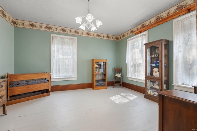 702 S Van Buren St, Auburn, IN 46706 - office with a chandelier and wood finished floors