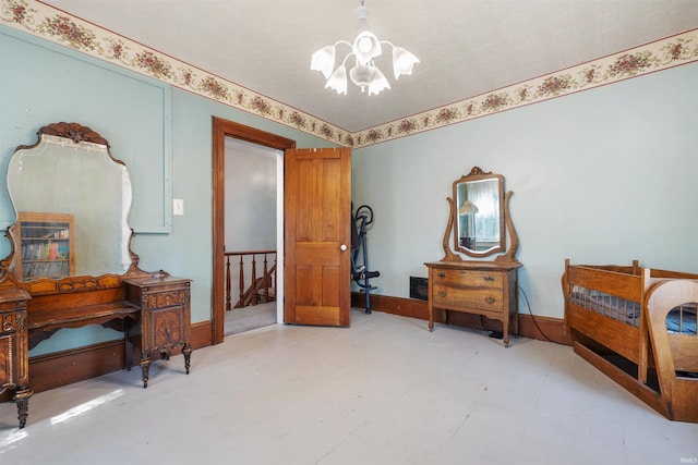 702 S Van Buren St, Auburn, IN 46706 - bedroom featuring a chandelier and tile patterned floors