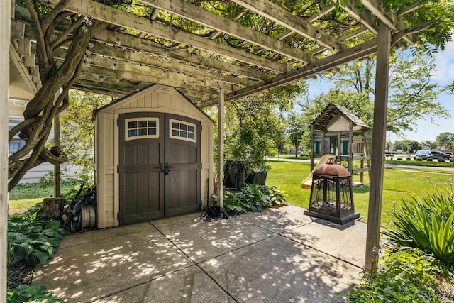 702 S Van Buren St, Auburn, IN 46706 - view of patio with a playground and a pergola