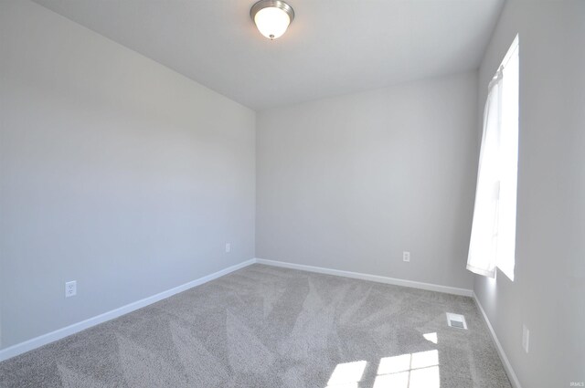409 W Somerfield Dr, Lakeville, IN 46536 - carpeted spare room featuring baseboards