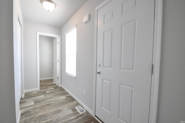 409 W Somerfield Dr, Lakeville, IN 46536 - corridor with wood finished floors and baseboards