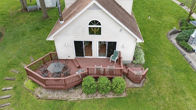 5585 S 930 E, Wolcottville, IN 46795 - back of property featuring a deck, a lawn, and a shingled roof