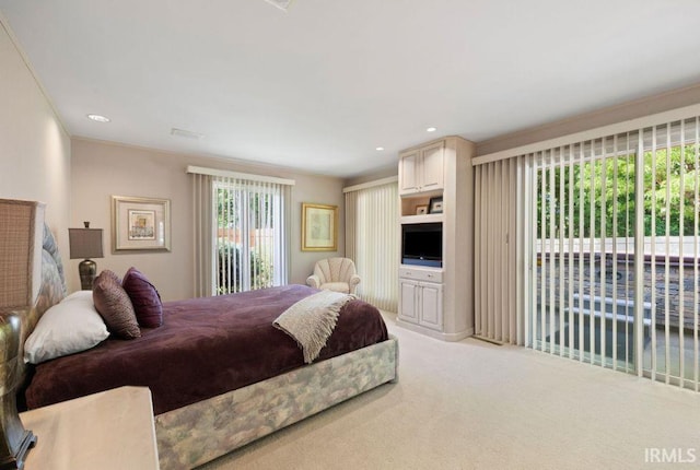 570 Golden Pl, Lafayette, IN 47905 - bedroom featuring access to exterior, light colored carpet, and recessed lighting