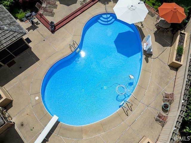 570 Golden Pl, Lafayette, IN 47905 - swimming pool featuring a patio